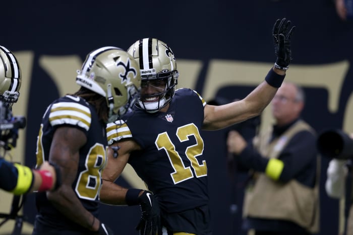 Chris Olave and Rashid Shaheed celebrate Olave's touchdown against the Los Angeles Rams.